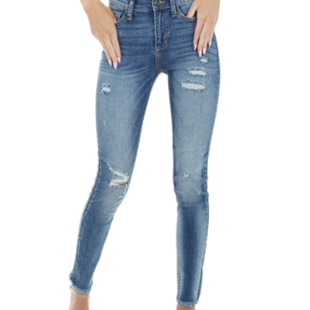 NWT....Medium Wash Mid Rise Jeans With Frayed Hem And Distressing....Size 13/31
